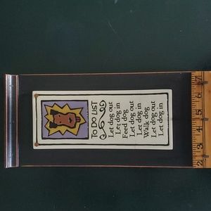 Wall hanging dog plaque